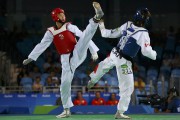 Arts martiaux: à chacun son style - image 4.0 Le taekwondo comprend des coups de poing et... (Photo archives AFP) - image 4.0
