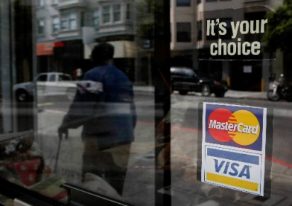 Cartes de crédit: pas de règlement à l'amiable au Canada D'après l'évaluation du Bureau de la concurrence, les... (Photo: Agence France-Presse)