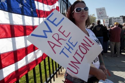 Moins de syndicats, moins de déficits? Récemment élu gouverneur de l'État de New York,... (Photo Reuters)