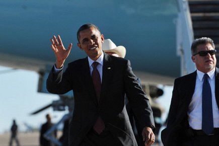 Barack Obama a salué le public à son... (Photo: AFP)