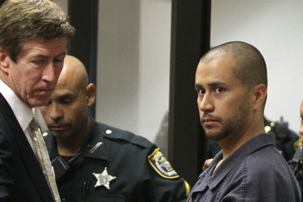 L'avocat Mark O'Mara et son client George Zimmerman en... (Photo: Reuters)