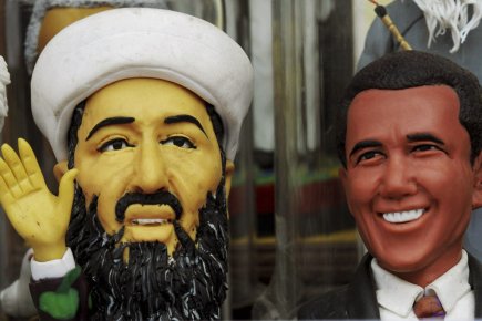 Des figurines du défunt chef d'Al-Qaïda, Oussama ben... (Photo: Reuters/ China Daily)