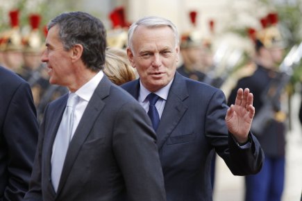 Jean-Marc Ayrault (au centre), que l'on voit ici... (Photo: Benoit Tessier, Reuters)