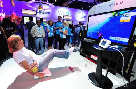 Jeux vidéo: une industrie en transition Une participante à la grand-messe du jeu vidéo... (Photo: AFP)