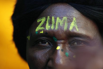 Une militante de l'ANC s'est fait peindre sur... (Photo: Themba Hadebe, AP)