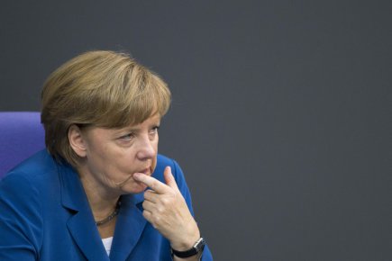 L'Espagne vacille, Merkel refuse les solutions «faciles» Dans un discours aux députés du Bundestag, chambre... (Photo Reuters)