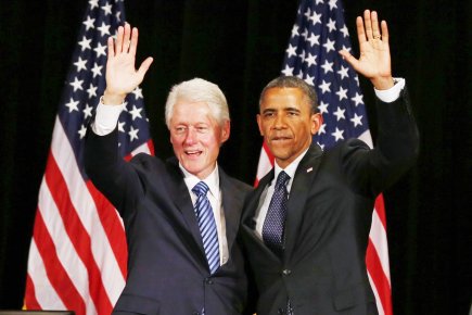 L'ex-président Clinton (à gauche), à la Maison-Blanche de... (PHOTO LARRY DOWNING, ARCHIVES REUTERS)