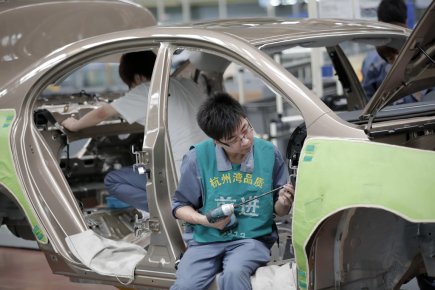 La Chine nourrit l'inquiétude Les experts s'inquiètent d'un ralentissement dans l'«atelier du... (PHOTO EUGENE HOSHIKO, ASSOCIATED PRESS)