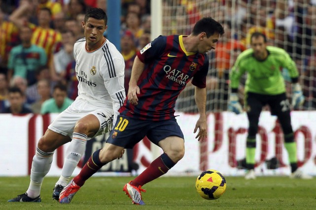 Cristiano Ronaldo et Lionel Messi... (Photo Gustau Nacarino, Reuters)