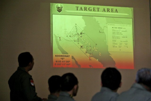 Le vol MH370 a disparu des écrans radars... (Photo Binsar Bakkara, AP)