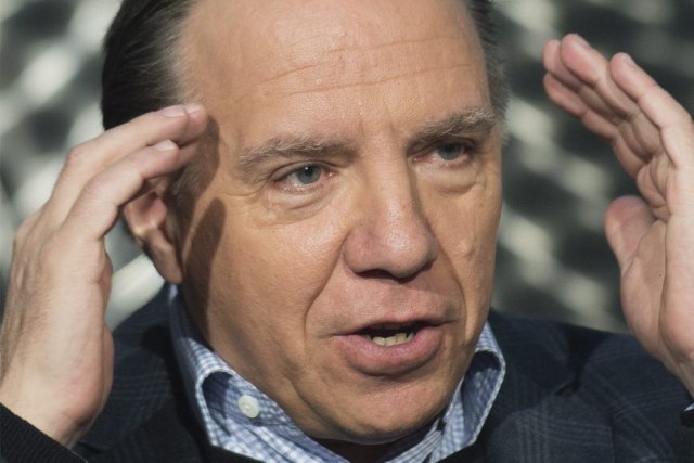 Enchères au profit du PQ: Marois «hypocrite», dénonce Legault «Mme Marois qui joue le foulard blanc, mais au... (PHOTO LA PRESSE CANADIENNE)