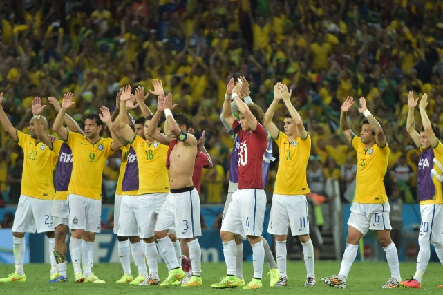 Le Brésil affrontera l'Allemagne en demi-finale du tournoi.... (PHOTO GABRIEL BOUYS, AFP)