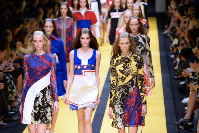 Maillots et bermudas de cycliste font partie de... (Photo BERTRAND GUAY, AFP)