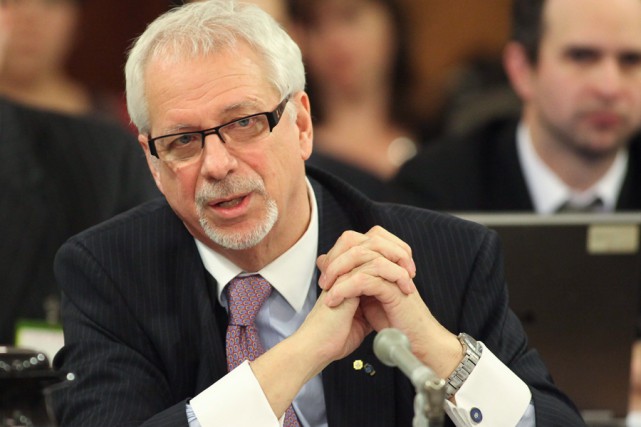 Le négociateur en chef Pierre Marc Johnson met aussi ses connaissances à... (PHOTO FRANCIS VACHON, ARCHIVES LA PRESSE CANADIENNE)