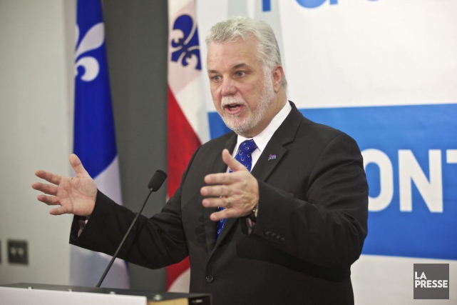 Vaccination: Couillard en appelle à la responsabilité des parents De passage à Montréal, vendredi matin, M. Couillard... (PHOTO ANDRÉ PICHETTE, LA PRESSE)