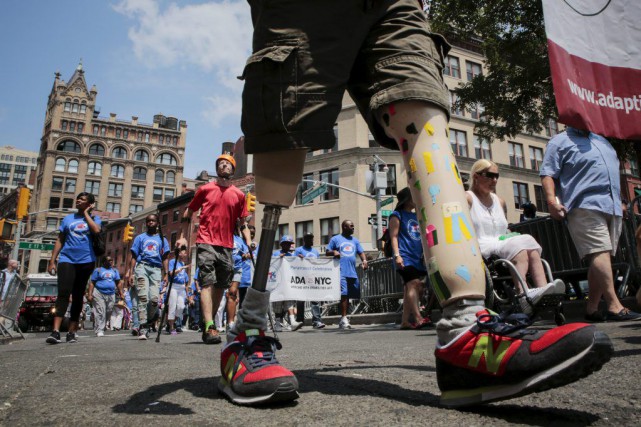 New York: des milliers de personnes marchent pour la Fierté des handicapés Le cortège dans lequel avaient pris place des... (PHOTO EDUARDO MUNOZ, REUTERS)