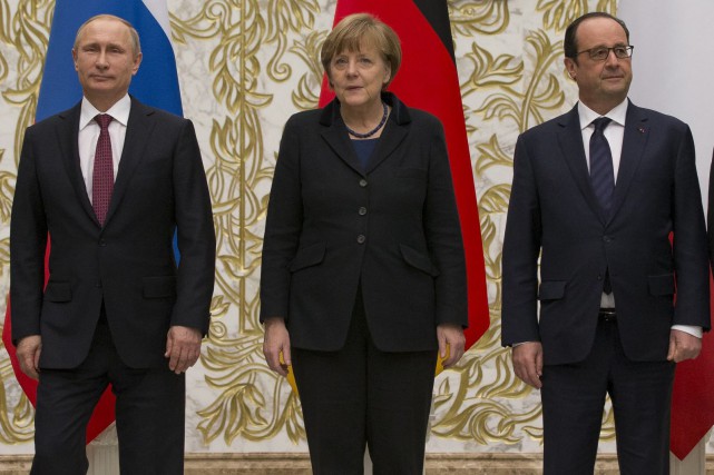 L'invasion Russe en Ukraine - Page 23 1050125-vladimir-poutine-angela-merkel-francois