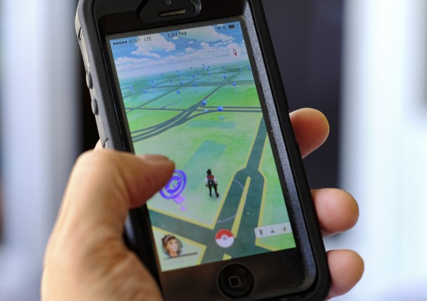 Pokemon Go Injuries Pokemon Go is displayed on a cell phone... (Photo AP)