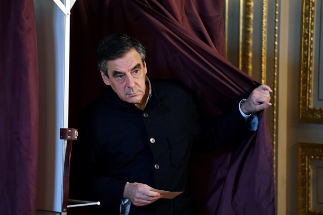 François Fillon a récolté 69,5 % des voix selon de... (Photo Eric Feferberg, AP)