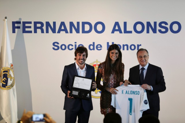 MOTOR-F1/ALONSO REAL MADRID Fernando Alonso, sa conjointe Linda Morselli et le... (Photo : REUTERS)