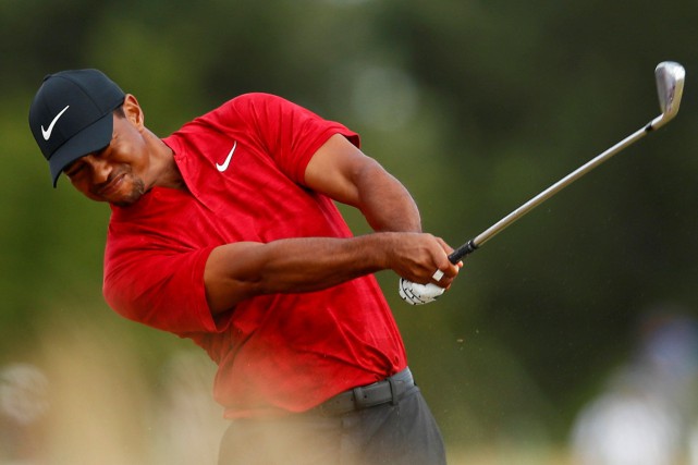 Omnium britannique: Tiger Woods à un coup de la tête