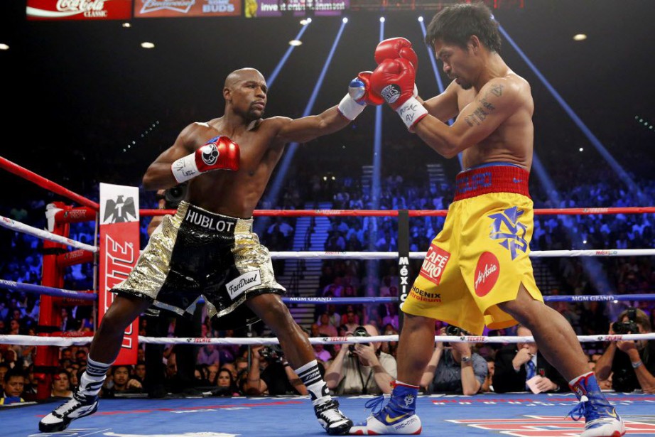 Floyd Mayweather et Manny Pacquiao... (Photo Steve Marcus, archives Reuters)