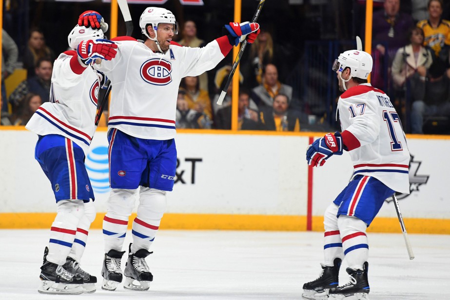 Les joueurs du Canadien fêtant leur victoire contre... (Photo Christopher Hanewinckel, USA Today Sports)