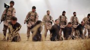 L'EI affirme avoir décapité un Américain et 18 soldats syriens - image 1.0 Dans la vidéo des exécutions, les combattants de... (Photo tirée d'une vidéo) - image 1.0