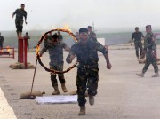 Une première brigade chrétienne créée en Irak - image 1.0 Les nouveaux soldats ont paradé et sauté à... (PHOTO SAFIN HAMED, AFP) - image 1.0