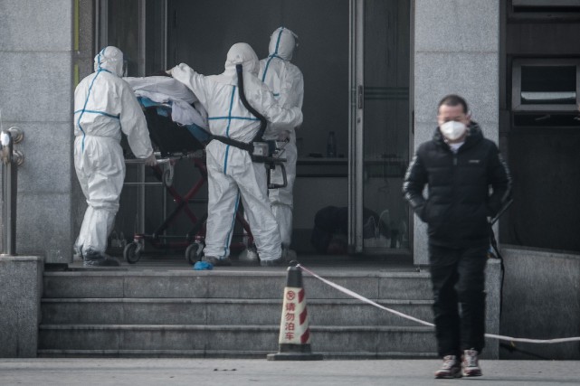 Chine: le virus transmissible entre humains, l'OMS convoque une réunion d'urgence