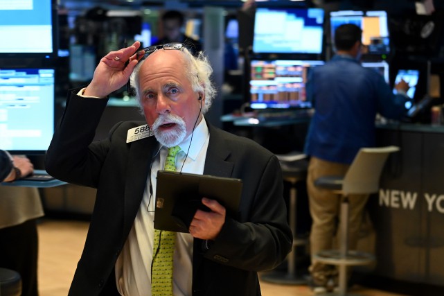 Le Dow Jones s'enfonce sous la barre des 20 000 points, le TSX sous les 12 000