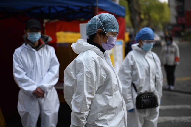 Coronavirus: la Chine se fige en hommage aux morts