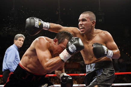 Juan Manuel Marquez, à droite et Juan Diaz... (Photo AP)