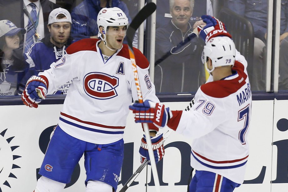 Max Pacioretty (67) festoie avec son coéquipier Andrei... (Photo John E. Sokolowski, USA Today)