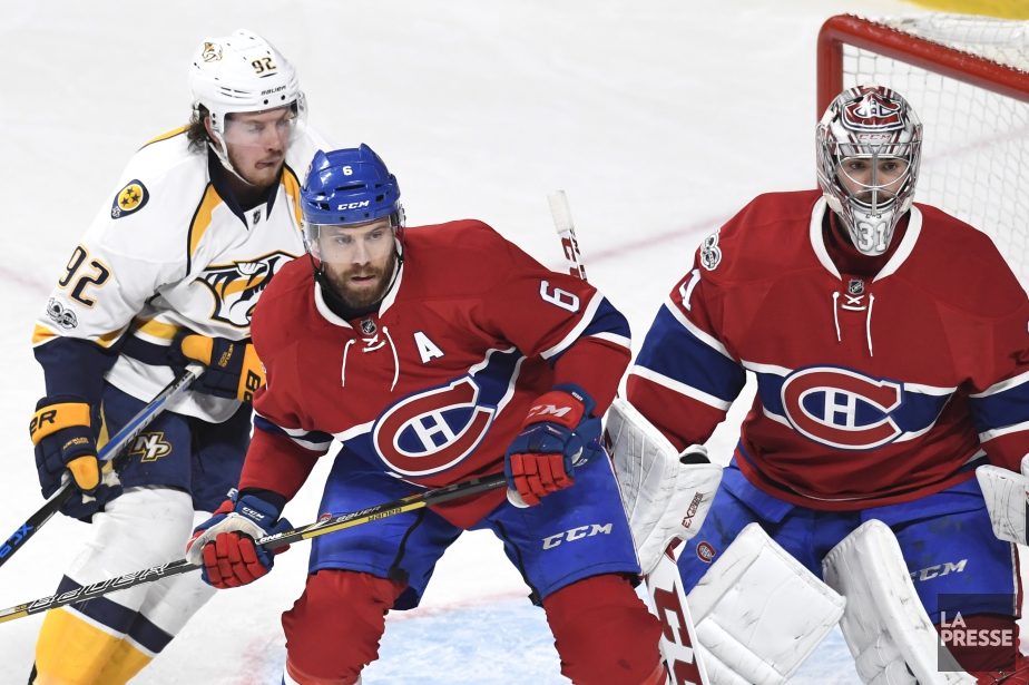 Shea Weber surveille de près Ryan Johansen devant Carey... (Photo Bernard Brault, La Presse)