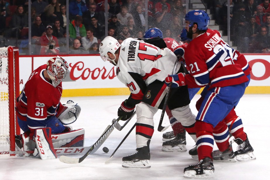 Carey Price bloque un tir de Nate Thompson... (Photo Jean-Yves Ahern, USA TODAY Sports)