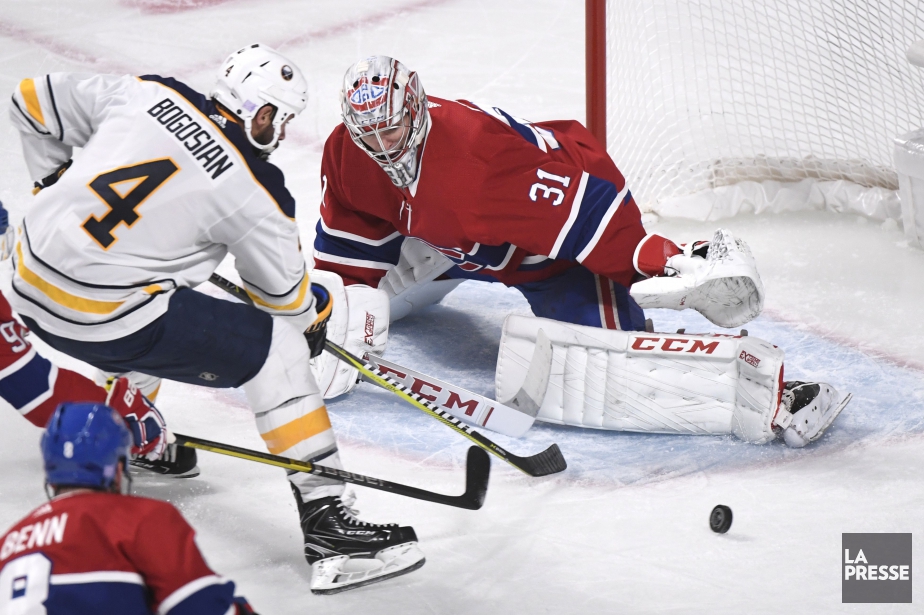 Carey Price bloque un tir de Zach Bogosian... (PHOTO BERNARD BRAULT, LA PRESSE)